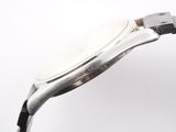 an image of a close up of a watch on a white surface