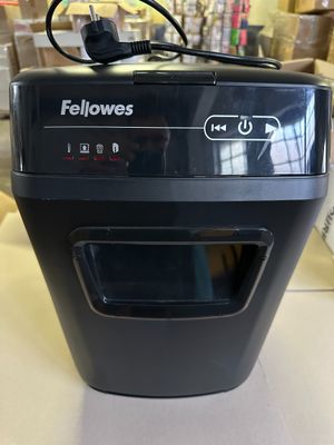 a black paper shredder sitting on a table