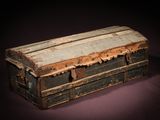 an old trunk that is sitting on a table