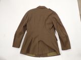 the back of a brown jacket on a white surface
