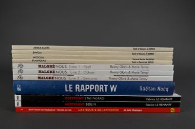 several books are stacked on top of each other on a table