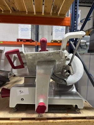 a machine that is sitting on a pallet in a warehouse