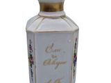 an image of a bottle of perfume on a white background