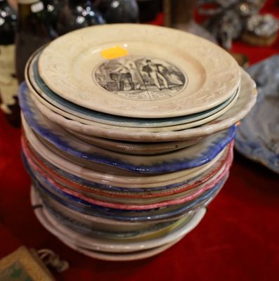 several plates stacked on top of each other on a table