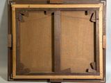 an old picture of a picture frame with a piece of wood in it
