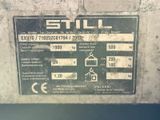 a sign on the side of a machine that says still
