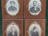 four framed portraits of men and women are on display in a wooden frame