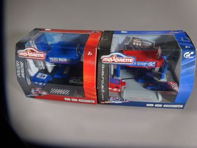 a toy truck that is in a box on a table