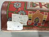 a small piece of carpet with a tag on it