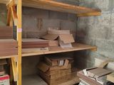 a lot of boxes and boxes on a shelf in a room