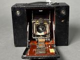 an old camera that is sitting on a table