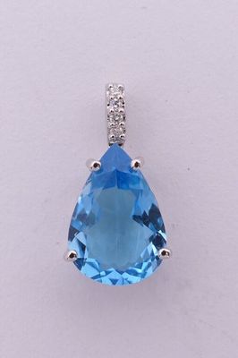Pendentif en or blanc 750%°.(18K) 1g85 orné d'une Topaze tai…