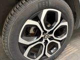 a close up of a tire on a vehicle