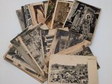 several old black and white photos of people and buildings on a table