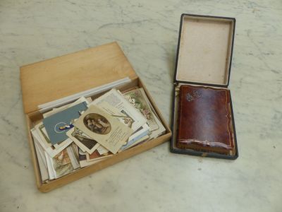 a small box with a book inside of it on a table