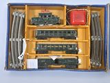 a box with a train set in it on a table