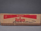 box of marlboro cigarettes on a grey background