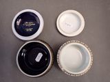 three different types of bowls are sitting on a table