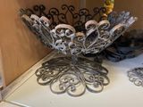 a decorative bowl sitting on top of a white counter