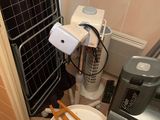 a small bathroom with a toilet and a shower