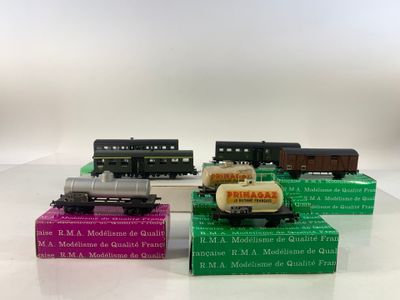 three toy trains sitting on top of a table next to each other