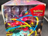 a close up of a box of pokemon toys on a table