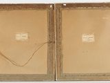 pair of antique picture frames of a man and a woman