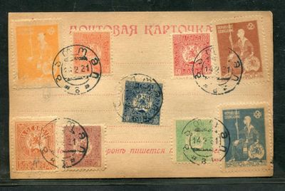 a picture of a postcard with a lot of stamps on it