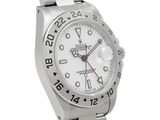 a close up of a wrist watch on a white background