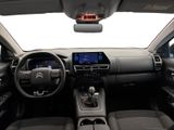 the interior of a car with a dashboard and steering wheel