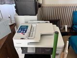 a pile of office supplies sitting on the floor