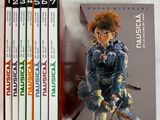 une boîte de livres sur laquelle figure l'image d'une femme