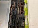 a box of drill bits sitting on a table