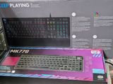 a box with a keyboard inside of it on a table