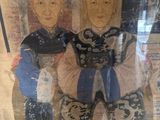 a picture of a picture of two people on display
