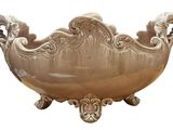 a large bowl that is sitting on a stand