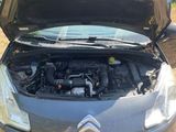 the engine of a car with its hood open and the hood open