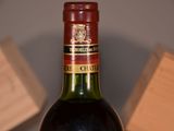 a bottle of wine that is sitting on a table