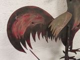 painting of a rooster on the side of a white wall