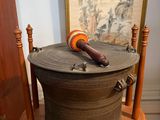 a large wooden box with a wooden handle on top of it