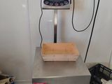 an image of a scale on a table in a room