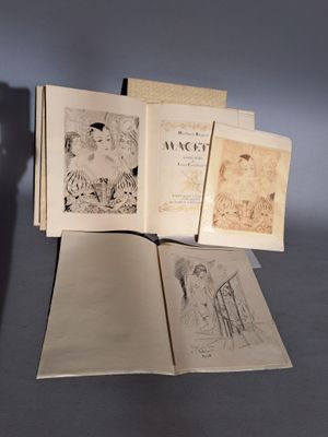 a lot of books that are open on a table
