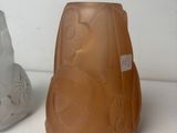 two vases sitting next to each other on a table