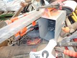 a pile of assorted tools sitting on a table