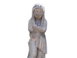 a small statue of a woman with a hat on