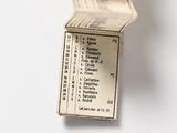 a folded up book with a list of things on it