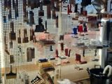 many tools hanging on a pegboard in a room