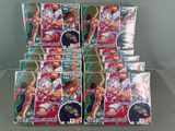 six packs of anime trading cards are stacked on top of each other
