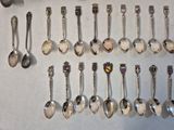 a lot of spoons and spoon spoons on the table