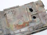 a close up of a model of a tank on a table